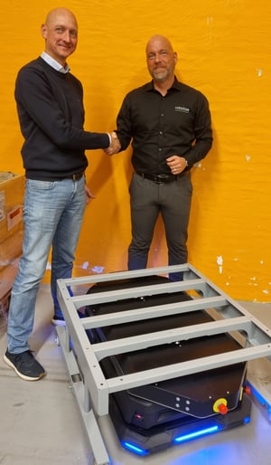 michael-ejstrup-hansen-roeq-left-and-roberto-giannetti-robotize-right-with-robotize-gopal-p35-amr-and-roeq-tmc300-and-roeq-cart500